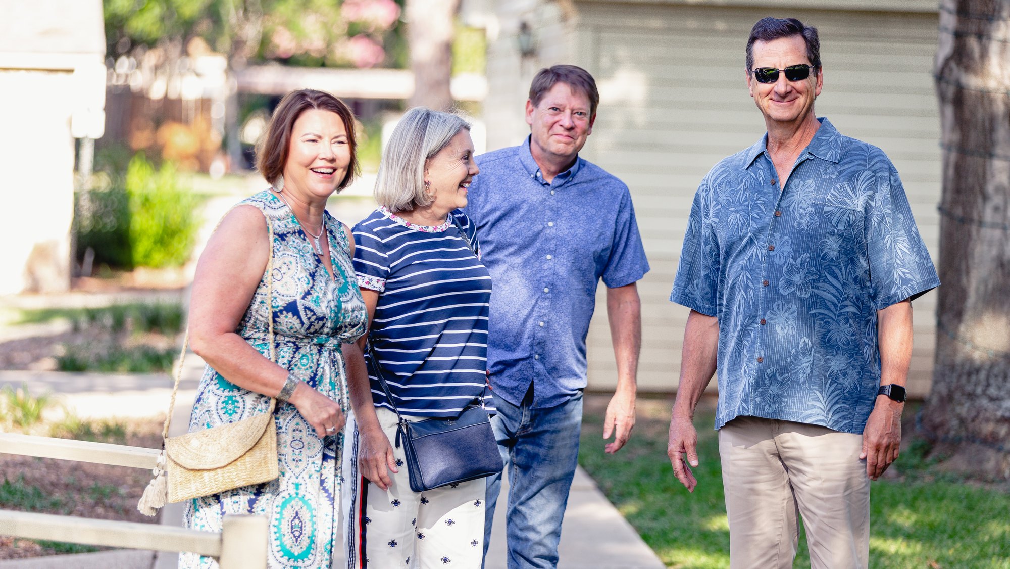 Neighbors laughing together in Granbury